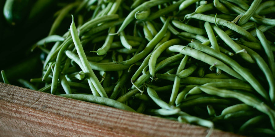 Fresh green beans in wooden box