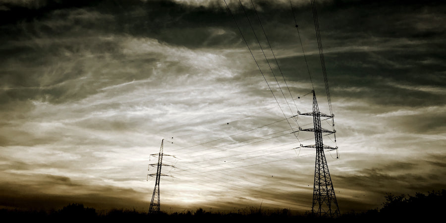 power lines and grey sky