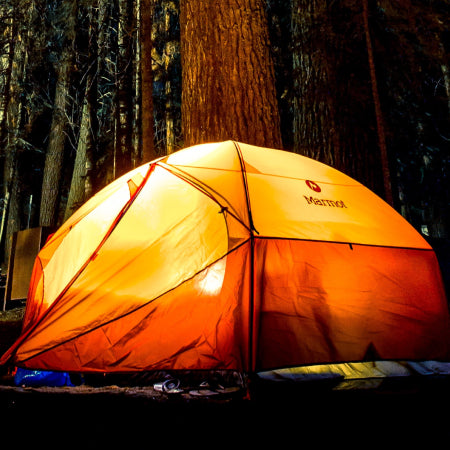 tent with lights at night