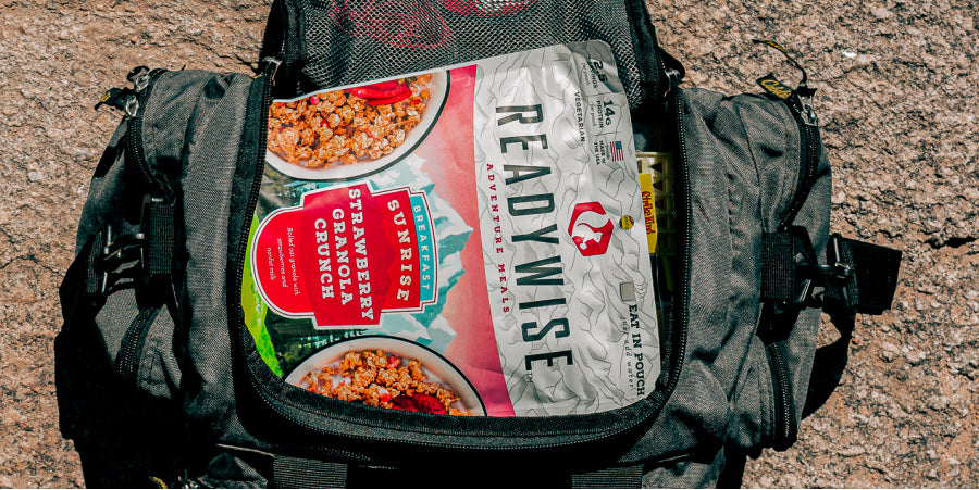 Survival kit backpack with a readywise emergency food pouch inside