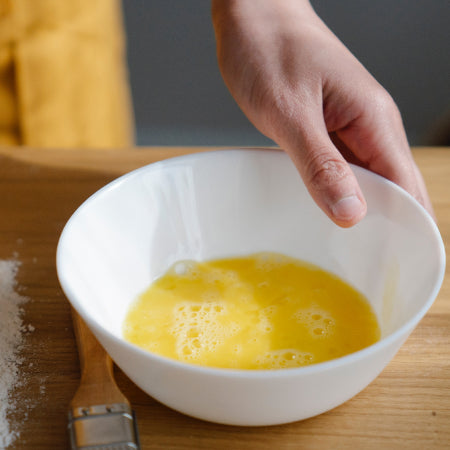 powdered eggs in a bowl ready to be scrambled